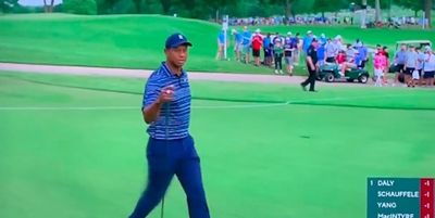 Tiger Woods told a cameraman three times to give him some breathing space after crushing opening drive