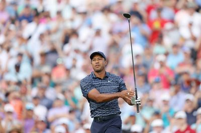 11 photos of Tiger Woods playing in the first round of the PGA Championship