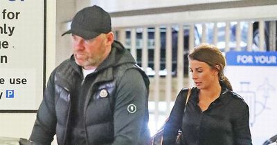 Coleen and Wayne Rooney arrive at Manchester Airport with huge suitcases as they ditch UK for Dubai