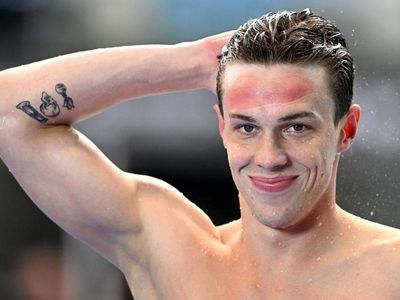 I can swim faster: world record holder