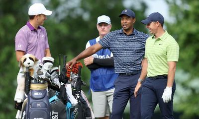 Rory McIlroy takes lead at US PGA as Tiger Woods struggles with leg pain