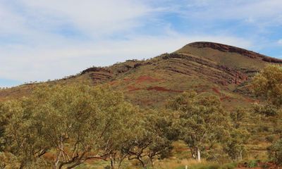 Juukan Gorge traditional owners sign agreement with Rio Tinto to co-manage WA mining land