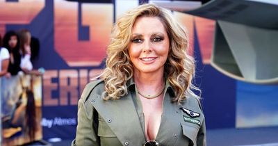 Carol Vorderman ditches gown as she parades curves in plunging outfit at Top Gun premiere