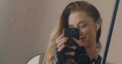 Una Healy flaunts ripped abs in sports bra as she says 'things come in threes'