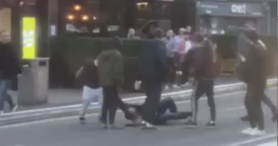 Shocking scenes as video shows man savagely beaten on ground in middle of busy Cork city street