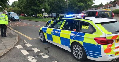 Emergency services rush to crash after car flips on side