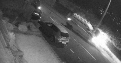 Van driver narrowly misses pedestrian as he crashes into four vehicles and lamppost