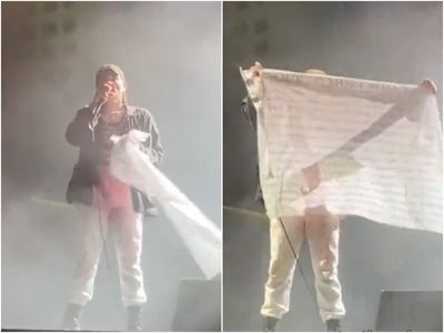 My Chemical Romance’s Gerard Way waves flag with names of fans who died during pandemic at Milton Keynes show