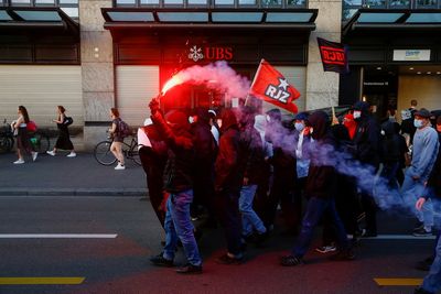 Protesters clash with police ahead of Davos meeting