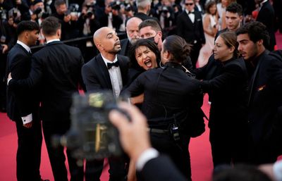 Cannes 2022: Topless woman protests at the red carpet against sexual violence in Ukraine, says 'Stop raping us'