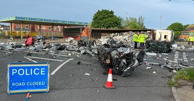 Road closed after scrap metal lorry overturns at the Rocket