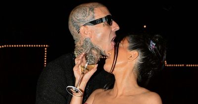 Travis Barker licks Kourtney Kardashian's head in very lusty PDA before Italy wedding