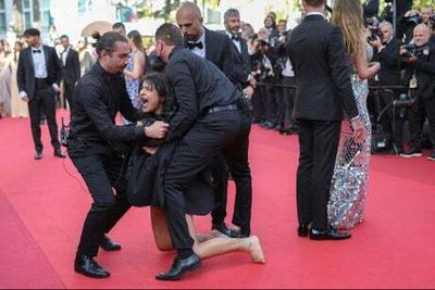 Cannes: Naked Ukraine protestor removed from Cannes Film Festival red carpet