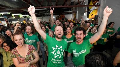 Greens celebrate 'shifting tectonic plates' in Queensland politics as losing rival candidates go to ground