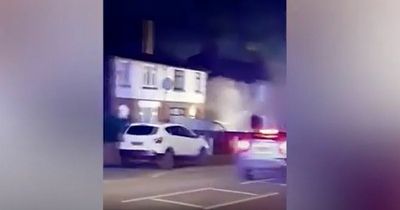 Footage shows smoke billowing from vehicle as emergency crews respond to fire