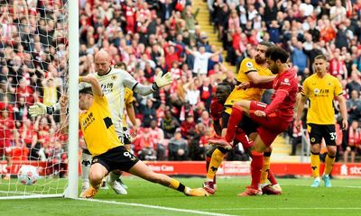 Liverpool fall short in title bid despite winning wild ride against Wolves