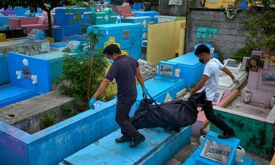 Victims of Duterte’s drug war in Philippines exhumed as leases run out on their graves