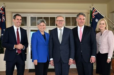 Australia's new PM heads to Tokyo with climate message