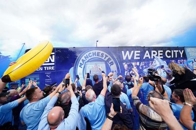 Two men charged after Manchester City title celebrations