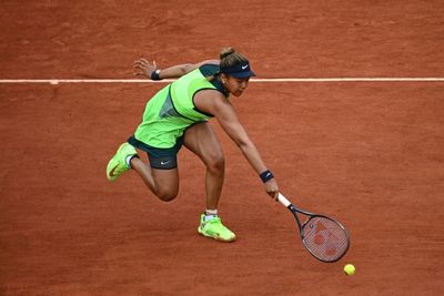 Osaka out at French Open as Swiatek extends winning run