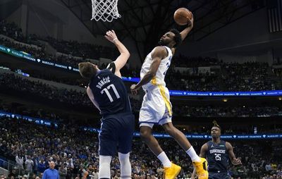 See every angle, incredible photos of Andrew Wiggins’ filthy posterizing dunk over Luka Doncic