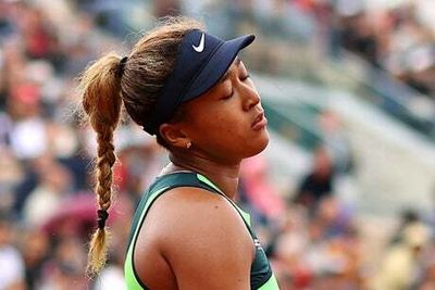 French Open: Naomi Osaka crashes out in round one on Roland Garros return but Iga Swiatek sails through