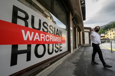 In Davos, Ukrainians host "Russian War Crimes House"