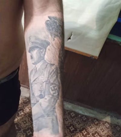 VIDEO: Ink-Redible Truth: Russia Forces Captured Ukrainian Troops To Show Off Their Nazi Tattoos