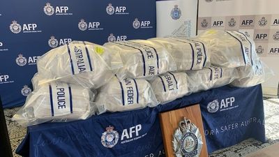 Cargo ship captain charged after 320 kilograms of cocaine seized in drug bust off WA coast