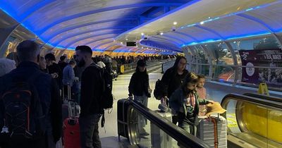 'Hell on earth': Manchester Airport passengers hit out at 'carnage' with long queues and 'four HOUR wait for luggage'