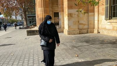Woman held younger sister while father stabbed her during 'attempted honour killing', court hears