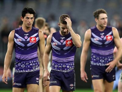 Chicken-wing tackle earns Docker AFL ban