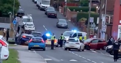 Chaos in Leeds street as police chase blocks road and man runs from officer