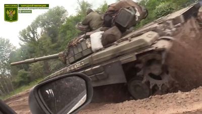 VIDEO: War In Ukraine: LPR Fighters Accuse Ukrainian Troops Of Using Scorched Earth Tactics