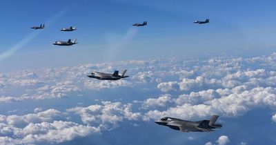 Japan scrambles jets after 'provocative' flyby by Russia and China warplanes on Tokyo's big day