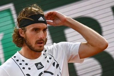 Tsitsipas in late night fightback to beat Musetti at French Open