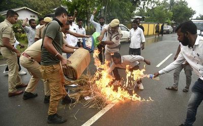 Assam tea plantation workers protest against clearing of estate for airport