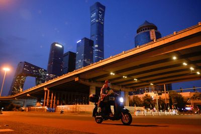 Tightening COVID net, Beijing issues punishments and stark warnings