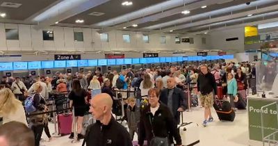 Airport passenger fed up with delays takes over Tannoy and belts out Sweet Caroline
