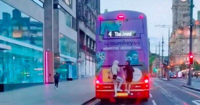 Youngsters cling onto back of bus in Edinburgh city centre in TikTok clip