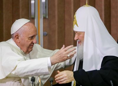 Pope greets Russian patriarch amid criticism of 'naivte'