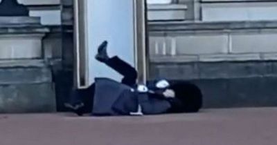 Buckingham Palace guard sent flying during drill landing flat on his back after slip