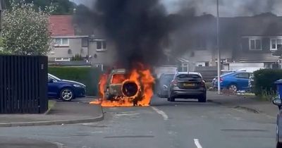 Midlothian emergency services raced to car engulfed in flames on quiet street