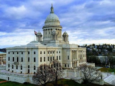 Rhode Island Becomes 19th State To Legalize Cannabis, Gov. Dan McGee Signs Bill Ending Prohibition