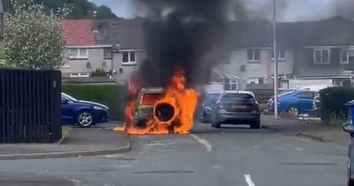 Car engulfed in flames on quiet Scots street as mercy crews rush to tackle blaze