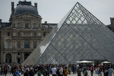 Louvre ex-director charged in art trafficking case