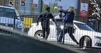 Scottish trio seen throwing punches after heated altercation in shop car park