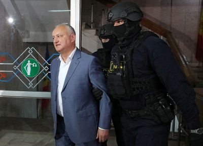 Moldova places former President Dodon under house arrest