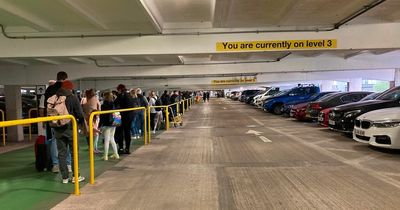 Manchester Airport queue stretches into car park from 4am in 'embarrassing' scenes