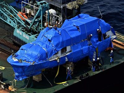 Barge carrying Kazu I arrives at Abashiri Port